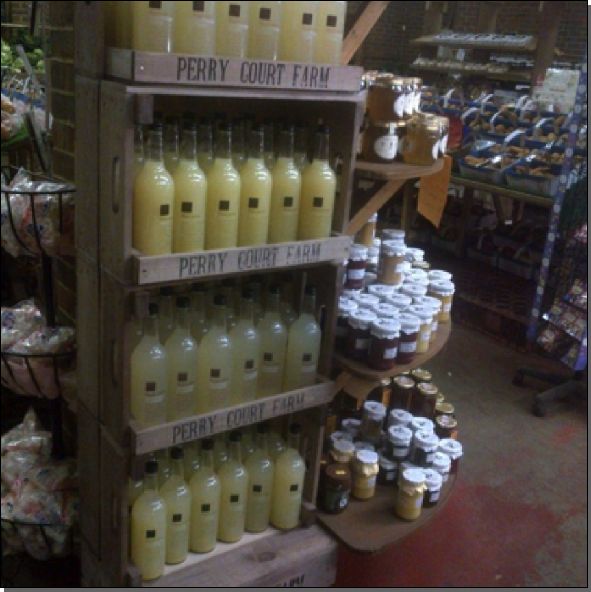 Bushel box display stand with Perry Court juice

